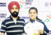 Judoka Shikha Bhau posing along with coach, Suraj Bhan Singh after winning bronze medal in KIUGs.
