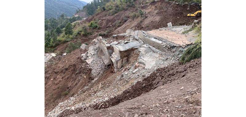 Restoration work in progress at Dalwas near Chanderkote in Ramban on Monday. —Excelsior/Parvaiz Mir Restoration work in progress at Dalwas near Chanderkote in Ramban on Monday. —Excelsior/Parvaiz Mir