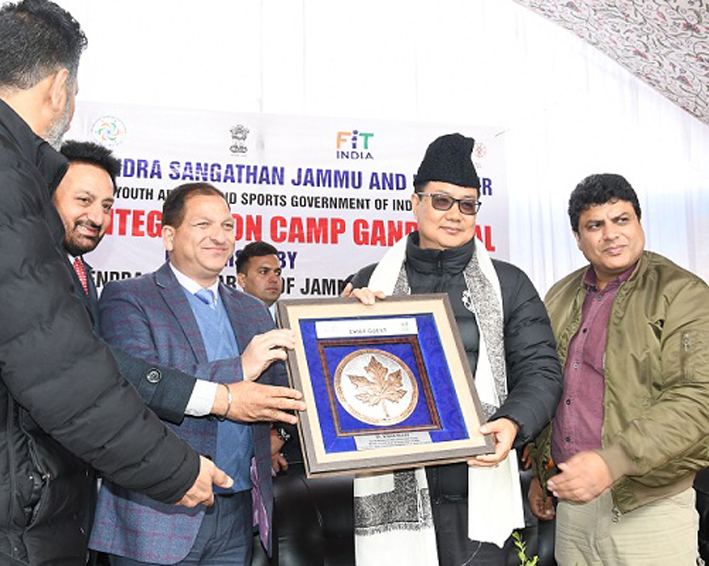 Union Sports Minister Kiren Rijiju being presented memento during National Integration Camp in Ganderbal. Union Sports Minister Kiren Rijiju being presented memento during National Integration Camp in Ganderbal.