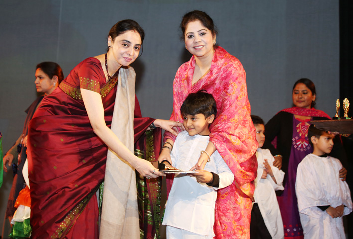 Dignitaries of the function felicitating a student during the Annual Day function. Dignitaries of the function felicitating a student during the Annual Day function.