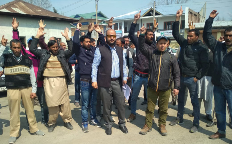 PDD employees protesting at Bemina in Srinagar. -Excelsior/Shakeel PDD employees protesting at Bemina in Srinagar. -Excelsior/Shakeel