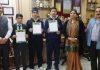 Meritorious students of DPS-SMTE exam posing for a photograph along with dignitaries of the DPS Jammu.