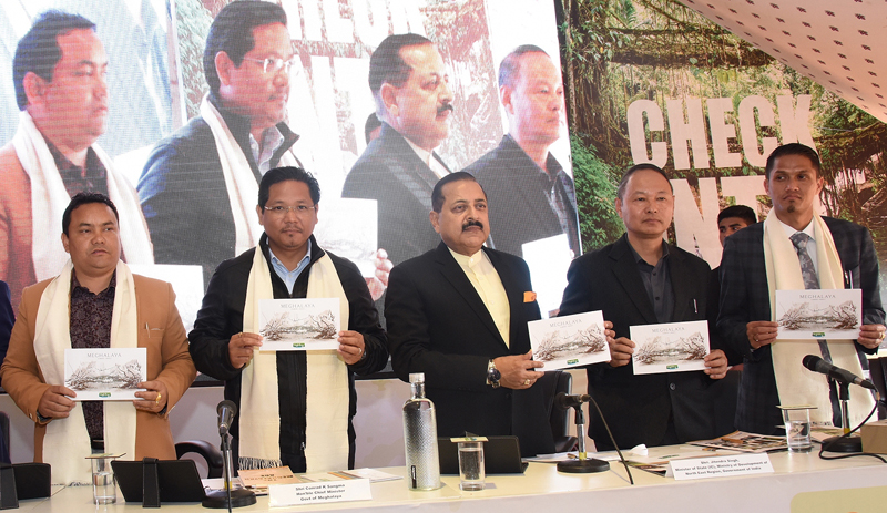 Union Minister Dr Jitendra Singh, flanked by Chief Minister Conrad Sangma, releasing a book based on rare Union Minister Dr Jitendra Singh, flanked by Chief Minister Conrad Sangma, releasing a book based on rare