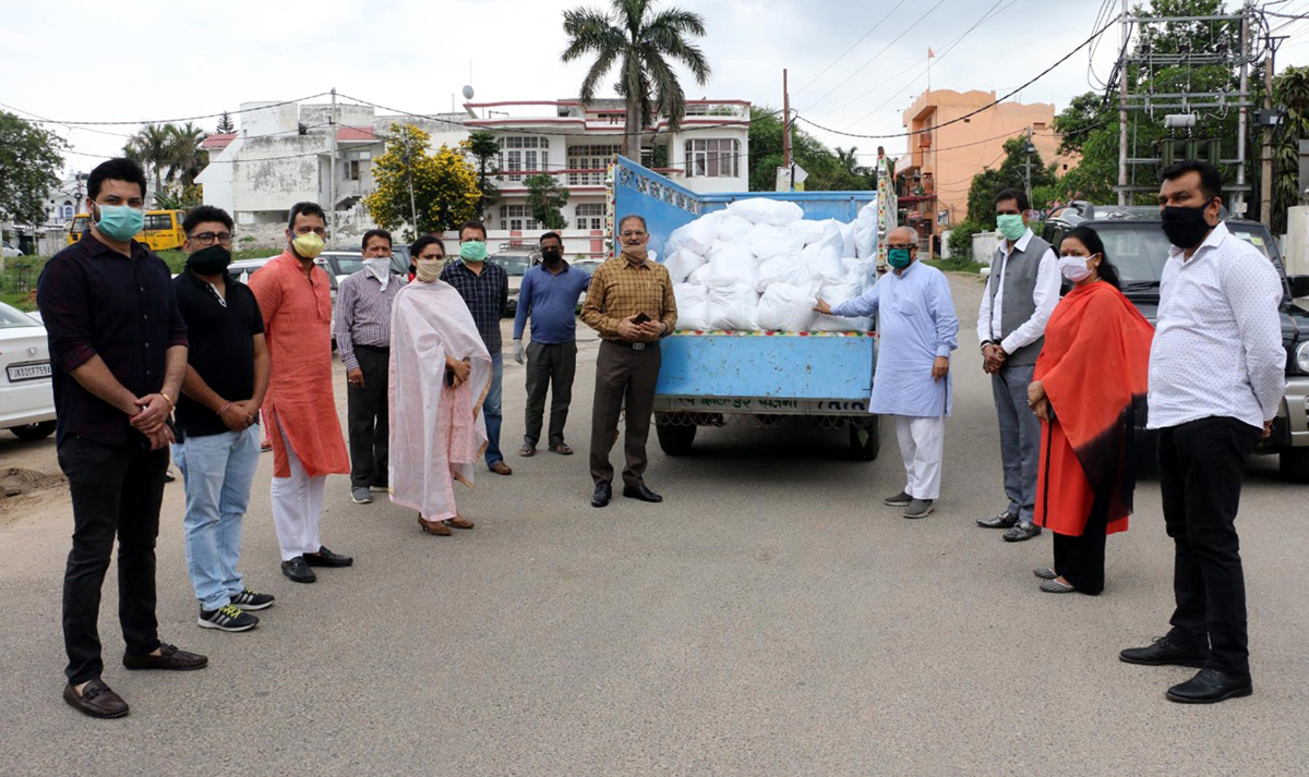 J&K BJP general secretary (Mahila Morcha) Advocate Neha Mahajan and BJP district Jammu general secretary Ankush Gupta handing over ration kits to BJP team of Ward 42, Nanak Nagar in Jammu. J&K BJP general secretary (Mahila Morcha) Advocate Neha Mahajan and BJP district Jammu general secretary Ankush Gupta handing over ration kits to BJP team of Ward 42, Nanak Nagar in Jammu.