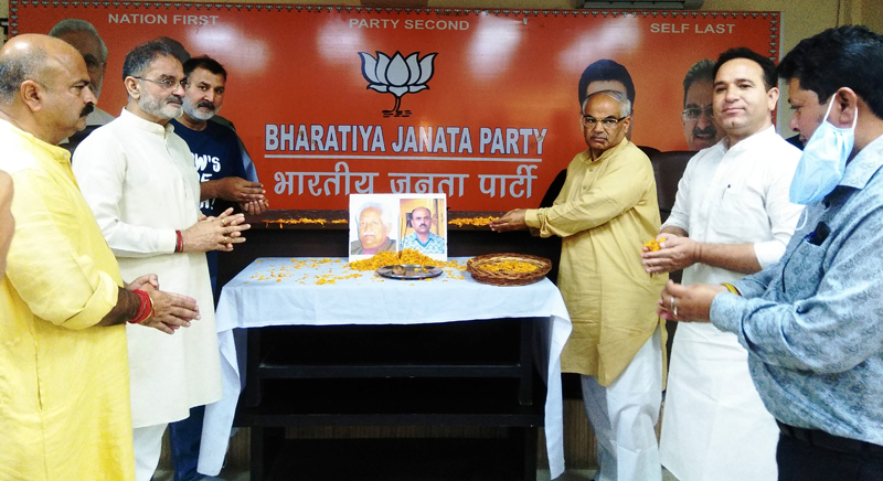 BJP leaders paying tributes to former party chief Daya Krishan Kotwal and RSS leader Chander Kant Sharma at Jammu on Wednesday. BJP leaders paying tributes to former party chief Daya Krishan Kotwal and RSS leader Chander Kant Sharma at Jammu on Wednesday.