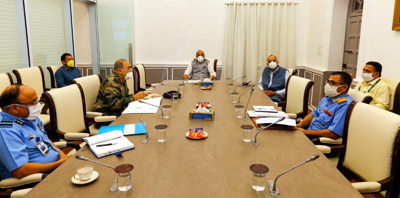 Defence Minister Rajnath Singh reviewing functioning of Armed Forces Medical Services (AFMS) and their assistance to civilian authorities in containing spread of COVID-19 pandemic, in New Delhi on Friday. (UNI) Defence Minister Rajnath Singh reviewing functioning of Armed Forces Medical Services (AFMS) and their assistance to civilian authorities in containing spread of COVID-19 pandemic, in New Delhi on Friday. (UNI)