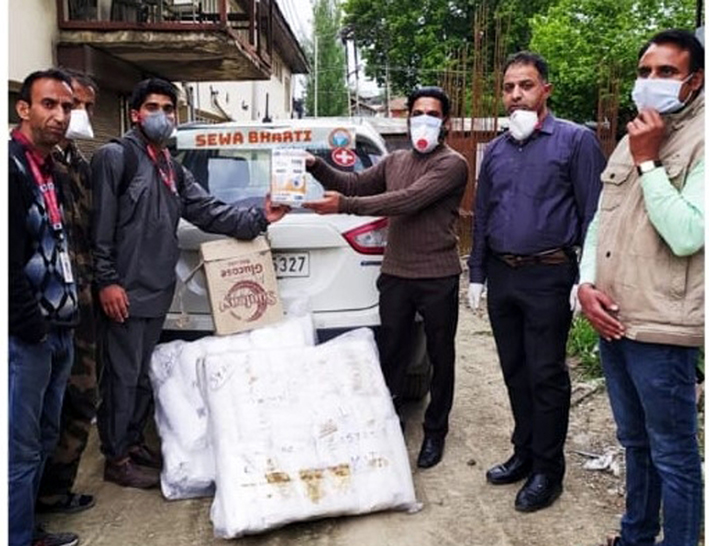 Sewa Bharti members presenting PPE kits to Principal GMC Srinagar on Sunday. Sewa Bharti members presenting PPE kits to Principal GMC Srinagar on Sunday.