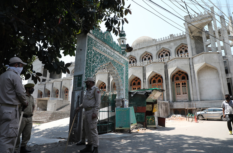 Police men stand guard outside a mosque in Jammu. —Excelsior/Rakesh Police men stand guard outside a mosque in Jammu. —Excelsior/Rakesh