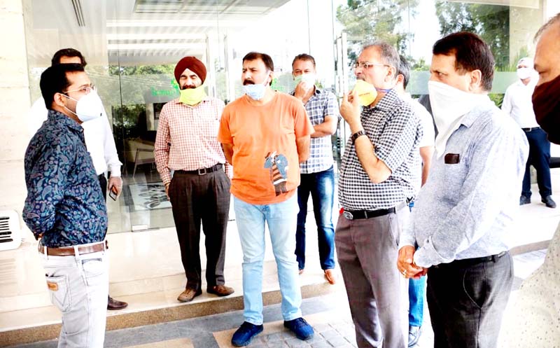 Former Deputy CM Kavinder Gupta interacting with an inmate of a quarantine center in Jammu. Former Deputy CM Kavinder Gupta interacting with an inmate of a quarantine center in Jammu.