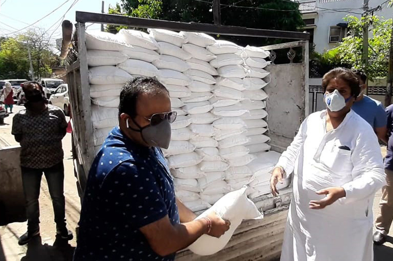 Former Minister Raman Bhalla distributing food packets among needy in Gandhi Nagar Constituency, Jammu. Former Minister Raman Bhalla distributing food packets among needy in Gandhi Nagar Constituency, Jammu.