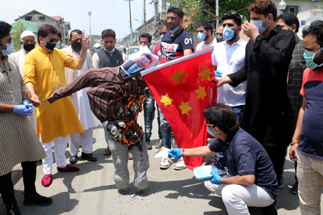 BJP protesting in Srinagar on Friday. — Excelsior/Shakeel BJP protesting in Srinagar on Friday. — Excelsior/Shakeel
