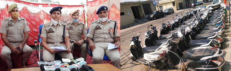 SP North Jammu PD Nitya along with her subordinates addressing a press conference (left) and stolen scooties recovered by Jammu police (right). SP North Jammu PD Nitya along with her subordinates addressing a press conference (left) and stolen scooties recovered by Jammu police (right).