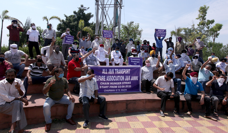 Transporters protesting in Jammu on Tuesday. —Excelsior/Rakesh Transporters protesting in Jammu on Tuesday. —Excelsior/Rakesh