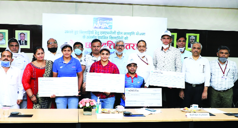 NHPC felicitating meritorious sportspersons under its scholarship scheme. NHPC felicitating meritorious sportspersons under its scholarship scheme.