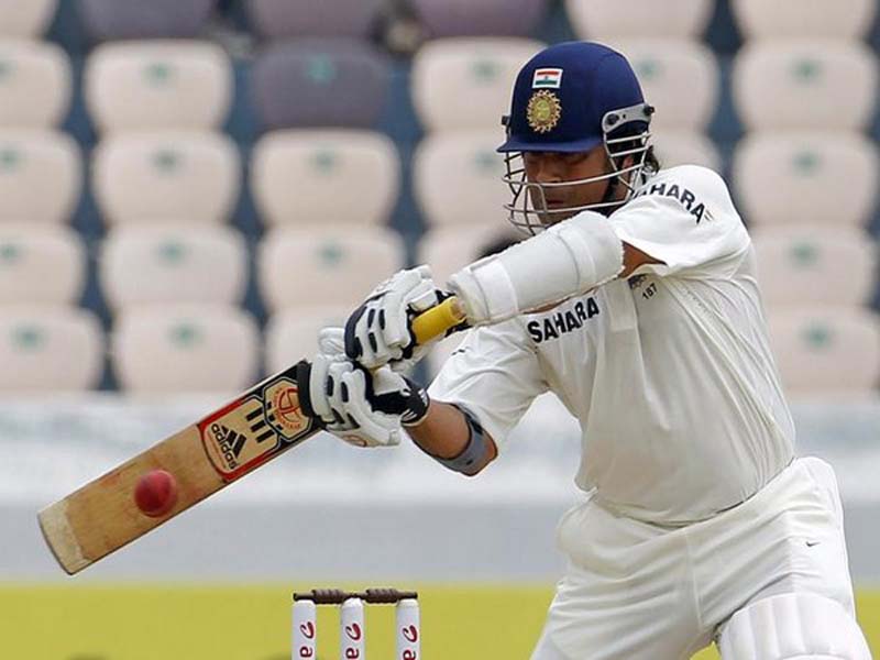 India's Tendulkar hits a shot during the first day of their first test cricket match against New Zealand in Hyderabad