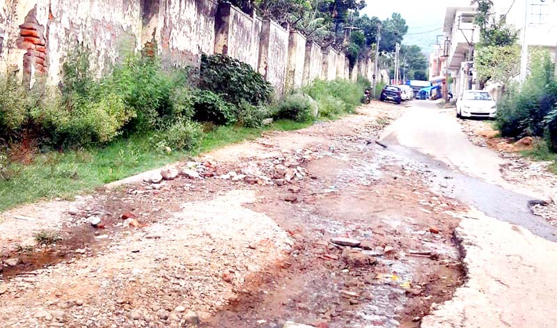 Damaged road near Military Hospital Udhampur.