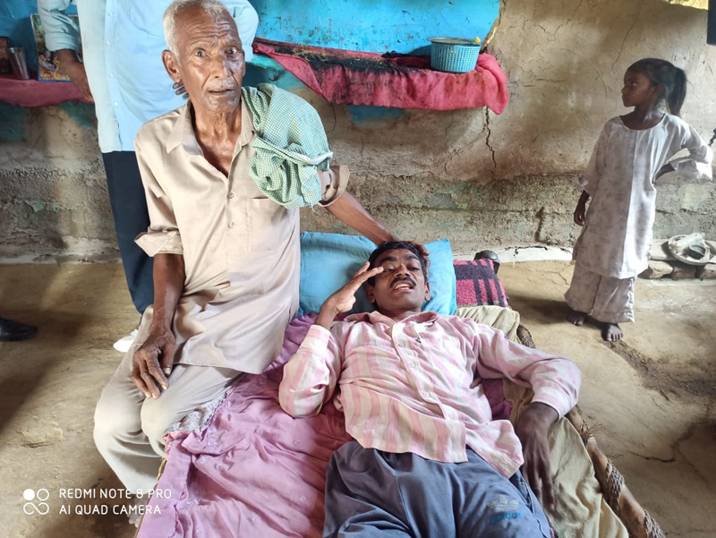 Shamsher Chand lying on a cot at his home in Samba district. Shamsher Chand lying on a cot at his home in Samba district.