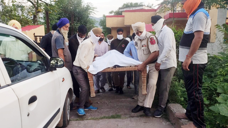 Dead body of murdered man being taken to village from Poonch Hospital. — Excelsior/Gurjeet Dead body of murdered man being taken to village from Poonch Hospital. — Excelsior/Gurjeet