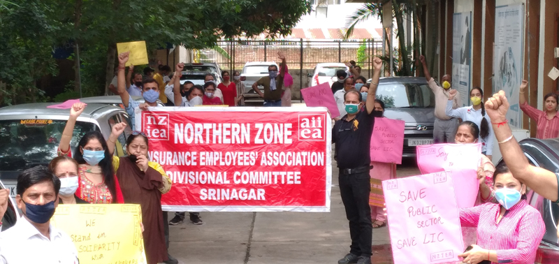 LIC employees staging protest in Jammu on Tuesday. LIC employees staging protest in Jammu on Tuesday.