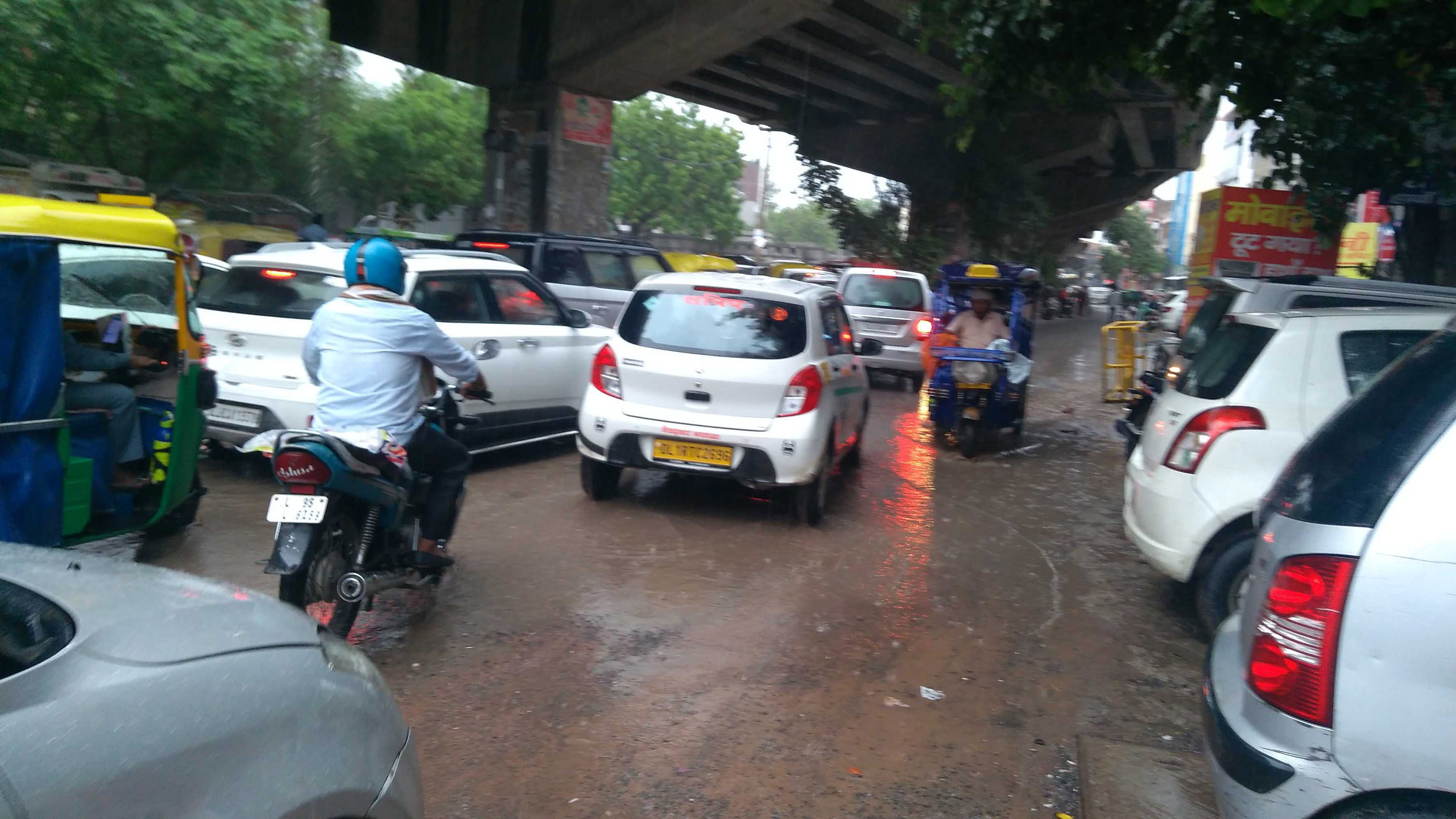 Traffic jam due to rain in New Delhi on Wednesday. (UNI) Traffic jam due to rain in New Delhi on Wednesday. (UNI)