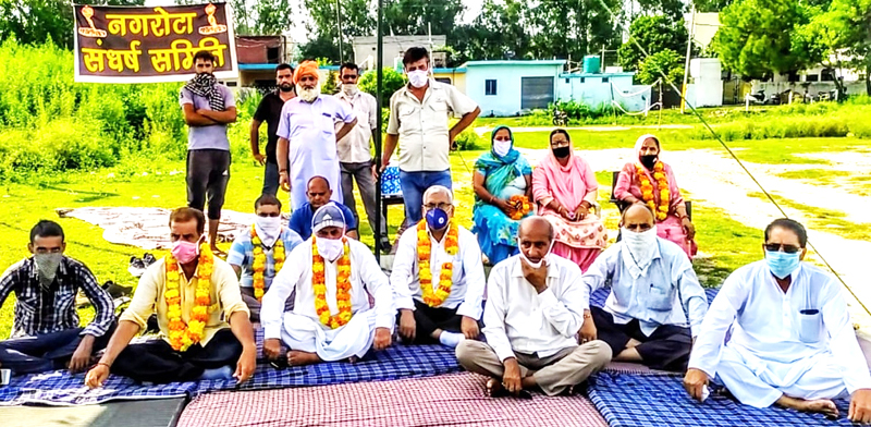 Sangarsh Samiti members during sit-in dharna on Wednesday. Sangarsh Samiti members during sit-in dharna on Wednesday.