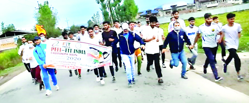 Students, teacher participating in Fit India Freedom Run organised by GHSS Sopore. Students, teacher participating in Fit India Freedom Run organised by GHSS Sopore.