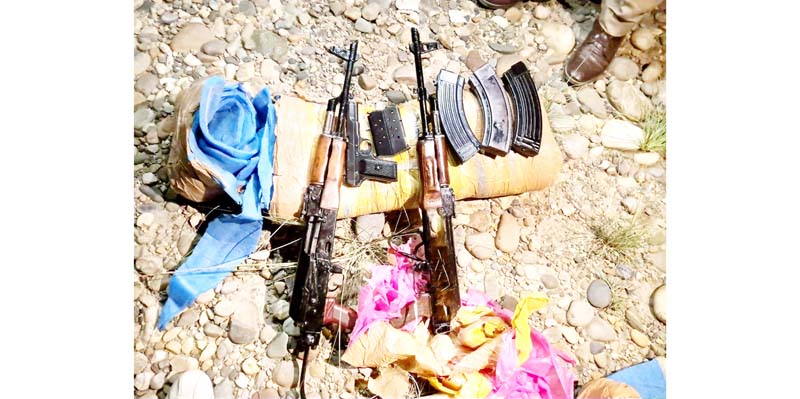 Arms and ammunition recovered at Sohal Khud in Akhnoor on Tuesday. Arms and ammunition recovered at Sohal Khud in Akhnoor on Tuesday.