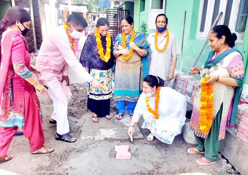 JMC Councillor, Anu Bali starting tile and drain work in Ward number 24 on Friday. JMC Councillor, Anu Bali starting tile and drain work in Ward number 24 on Friday.