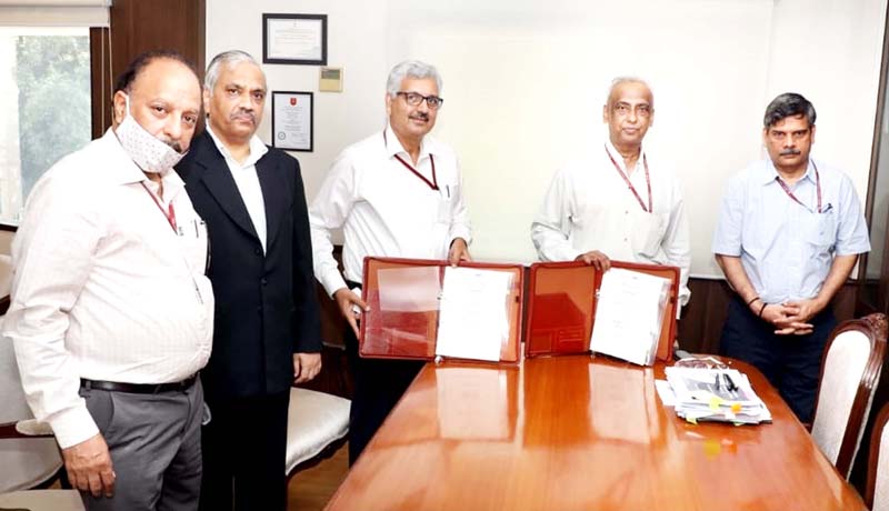 Representatives of NHPC and Ministry of Power signing a MoU at New Delhi on Tuesday. Representatives of NHPC and Ministry of Power signing a MoU at New Delhi on Tuesday.
