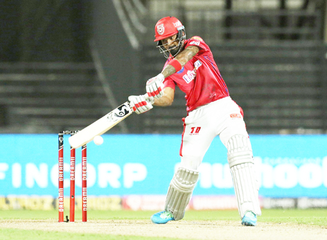 K L Rahul executing shot against Royal Challengers Bangalore during a match at Sharjah on Thursday. K L Rahul executing shot against Royal Challengers Bangalore during a match at Sharjah on Thursday.