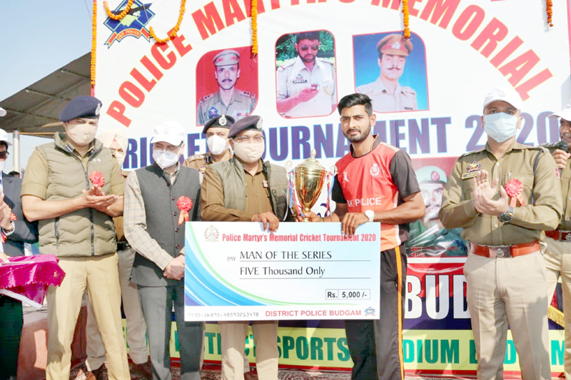 DGP Dilbag Singh presenting Man of the Series award to a player during closing ceremony of Martyrs Cricket Tournament at Budgam on Thursday. DGP Dilbag Singh presenting Man of the Series award to a player during closing ceremony of Martyrs Cricket Tournament at Budgam on Thursday.