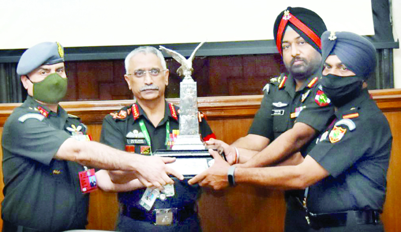 Chief of Army Staff, Gen MM Naravane presenting the COAS Flight Safety Trophy to Commanding Officer & Subedar Major of the 663 Army Aviation Squadron on the concluding day of the Army Commanders’ Conference at New Delhi on Thursday Chief of Army Staff, Gen MM Naravane presenting the COAS Flight Safety Trophy to Commanding Officer & Subedar Major of the 663 Army Aviation Squadron on the concluding day of the Army Commanders’ Conference at New Delhi on Thursday