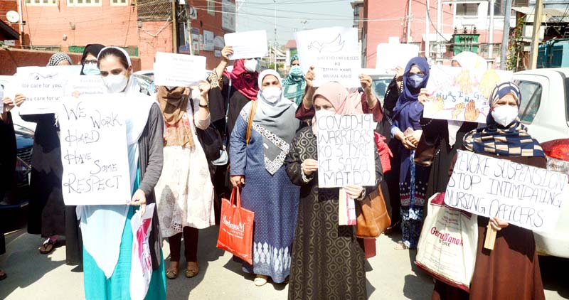 SKIMS Soura female staff protesting on Monday. -Excelsior/Shakeel SKIMS Soura female staff protesting on Monday. -Excelsior/Shakeel