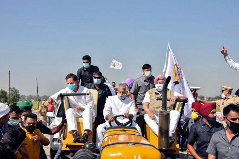 Congress leader Rahul Gandhi, Punjab Chief Minister Capt Amarinder Singh and other leaders during a tractor rally, 'Kheti Bachao Yatra', in protest against the new farm bills in Punjab's Moga district. Congress leader Rahul Gandhi, Punjab Chief Minister Capt Amarinder Singh and other leaders during a tractor rally, 'Kheti Bachao Yatra', in protest against the new farm bills in Punjab's Moga district.