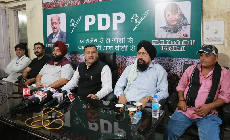 District PDP president, Rajinder Manhas chairing a meeting at Jammu on Friday.