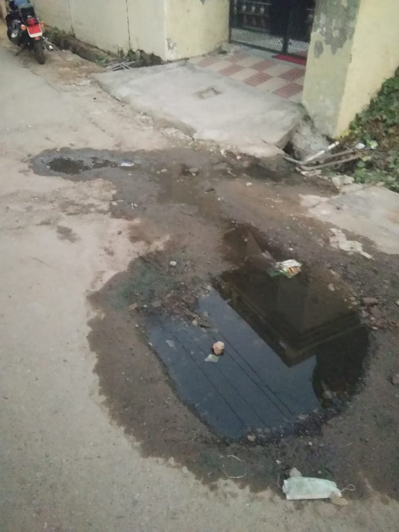Dirty water coming out from a sewerage hole in Green Avenue, Tallab Tillo in Jammu. Dirty water coming out from a sewerage hole in Green Avenue, Tallab Tillo in Jammu.