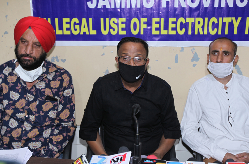 Senior members of J&K CNGEEU, Parshotam Sharma, Gurnam Singh and others addressing press conference in Jammu. —Excelsior/ Rakesh