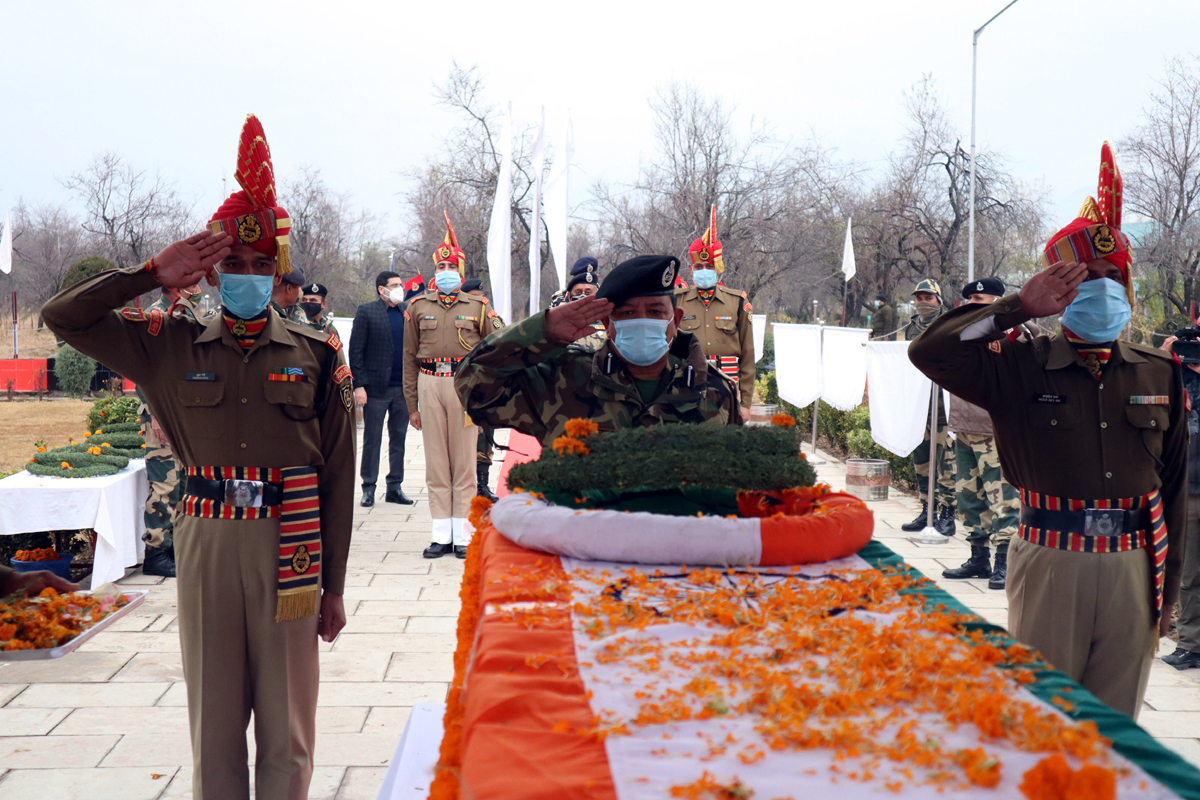 BSF personnel paying tribute to their colleague Sub Inspector Rakesh Dobhal during wreath laying ceremony. BSF personnel paying tribute to their colleague Sub Inspector Rakesh Dobhal during wreath laying ceremony.