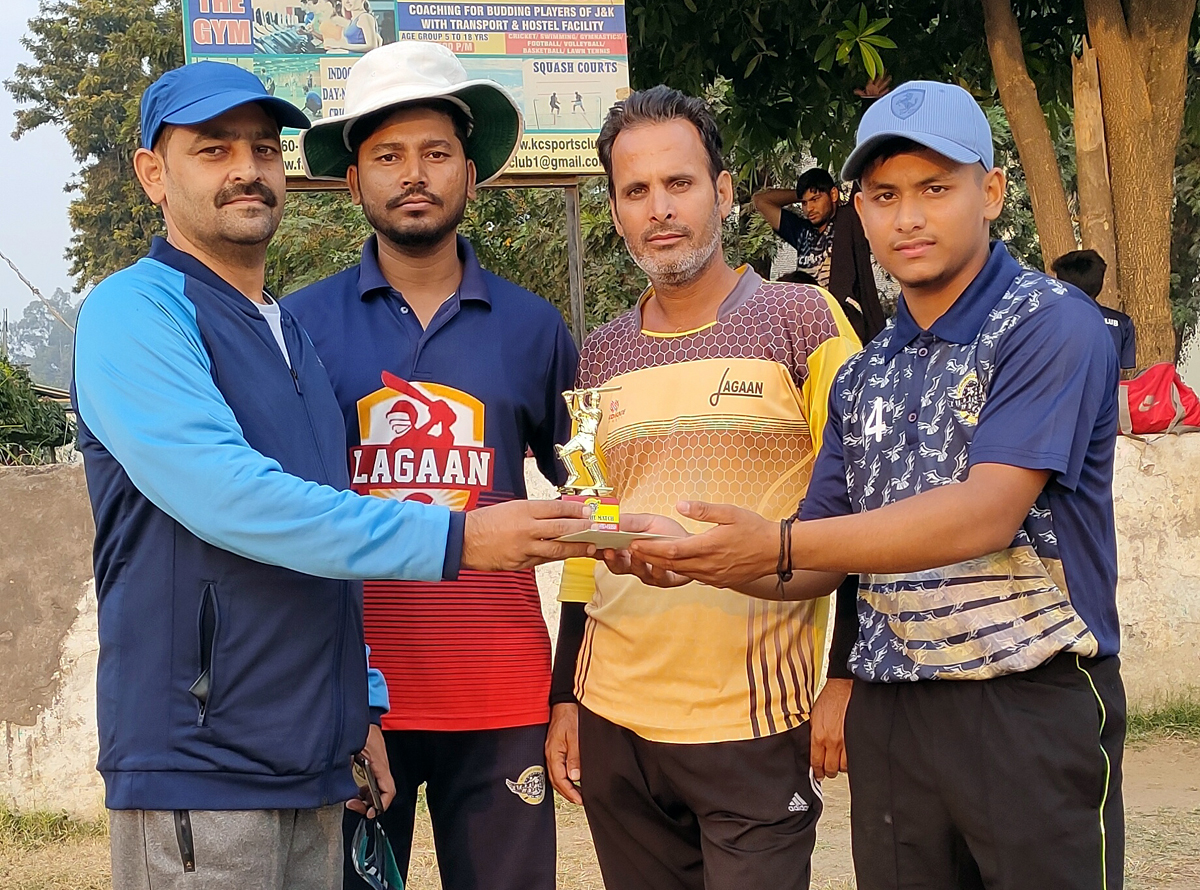 Dignitaries presenting trophy to a player after the match at Jammu. Dignitaries presenting trophy to a player after the match at Jammu.