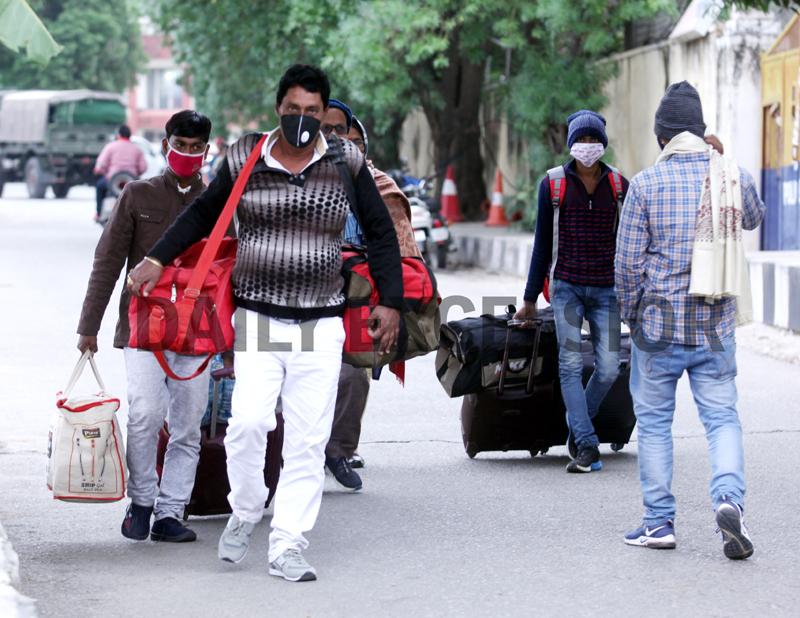 Passengers coming out from Railway Station Jammu on Tuesday. -Excelsior/Rakesh Passengers coming out from Railway Station Jammu on Tuesday. -Excelsior/Rakesh