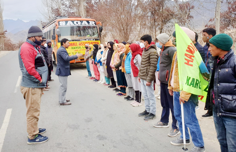 Haji Mirza Hussain, President Kargil Olympic Association interacting with Handball team players. -Excelsior/Basharat Ladakhi Haji Mirza Hussain, President Kargil Olympic Association interacting with Handball team players. -Excelsior/Basharat Ladakhi
