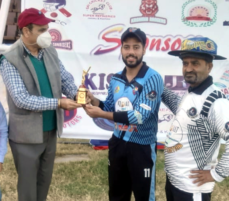 Dr TK Moza presenting man of the match award to Akash Raina at MA Stadium in Jammu. Dr TK Moza presenting man of the match award to Akash Raina at MA Stadium in Jammu.