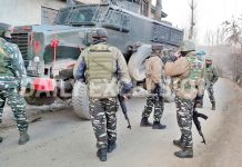 Security forces at the site of encounter at Kanigam, Shopian on Saturday. -Excelsior/Younis Khaliq