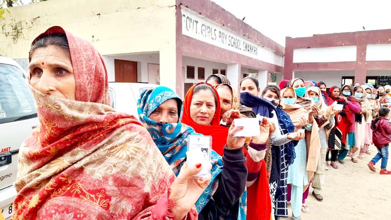 A long queue of voters in front of a polling booth in Swankha DDC constituency on Monday. -Excelsior/Badyal A long queue of voters in front of a polling booth in Swankha DDC constituency on Monday. -Excelsior/Badyal