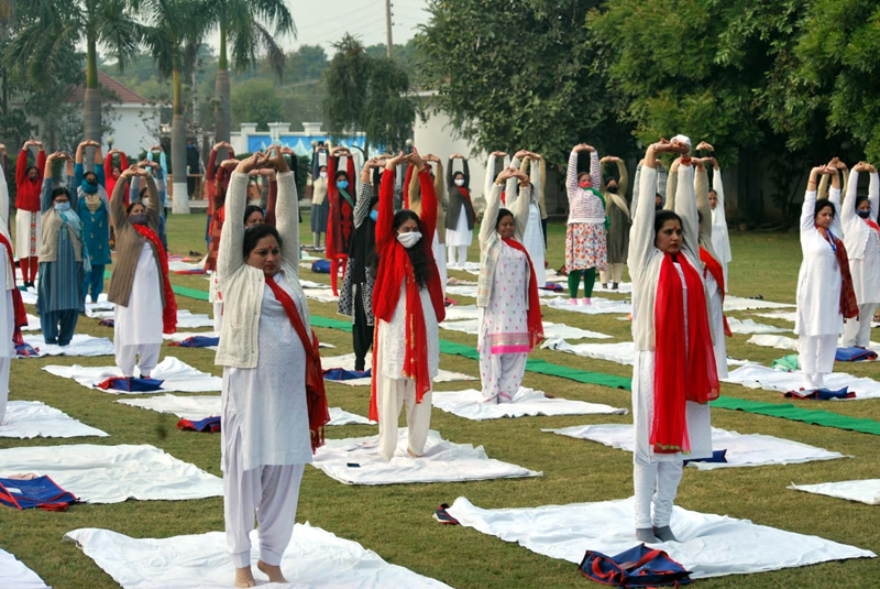 Ladies performing Yoga exercises at a function on 'Mahila Yog Shakti Diwas' in Jammu on Friday. Ladies performing Yoga exercises at a function on 'Mahila Yog Shakti Diwas' in Jammu on Friday.