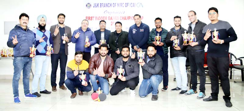 Dignitaries and winning players posing for a group photograph at Jammu. Dignitaries and winning players posing for a group photograph at Jammu.