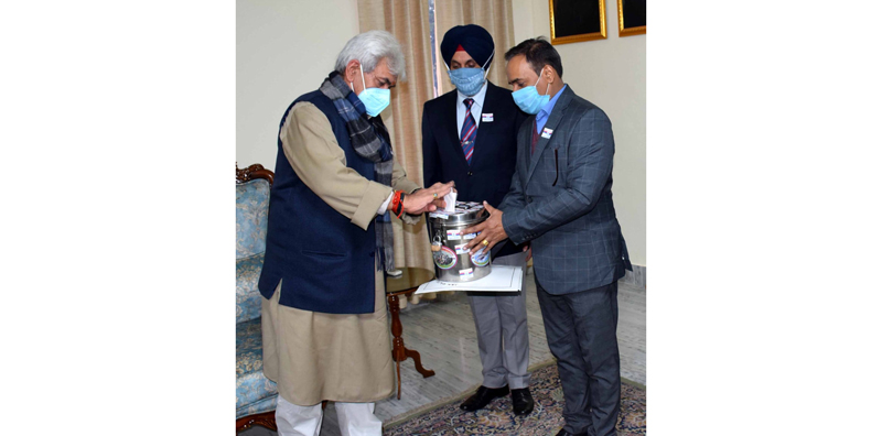 Lt Governor Manoj Sinha contributing towards Armed Forces Flag Day Fund. Lt Governor Manoj Sinha contributing towards Armed Forces Flag Day Fund.