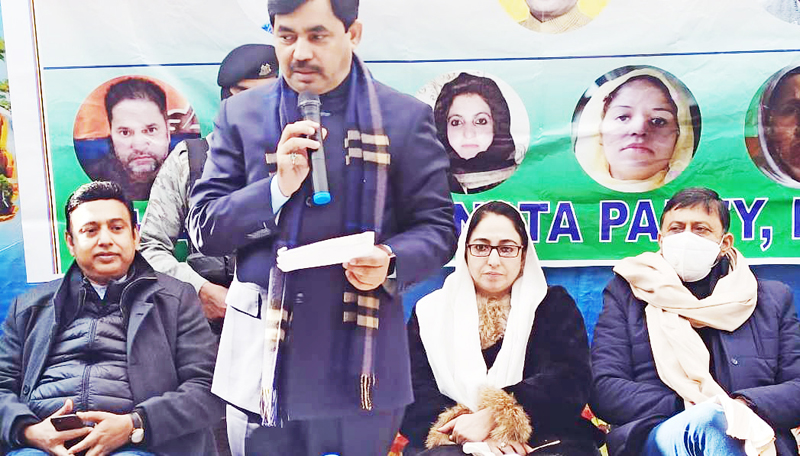 BJP senior leader Syed Shahnawaz Hussain addressing an election rally at B K Pora in Budgam on Tuesday. -Excelsior/ Shakeel BJP senior leader Syed Shahnawaz Hussain addressing an election rally at B K Pora in Budgam on Tuesday. -Excelsior/ Shakeel