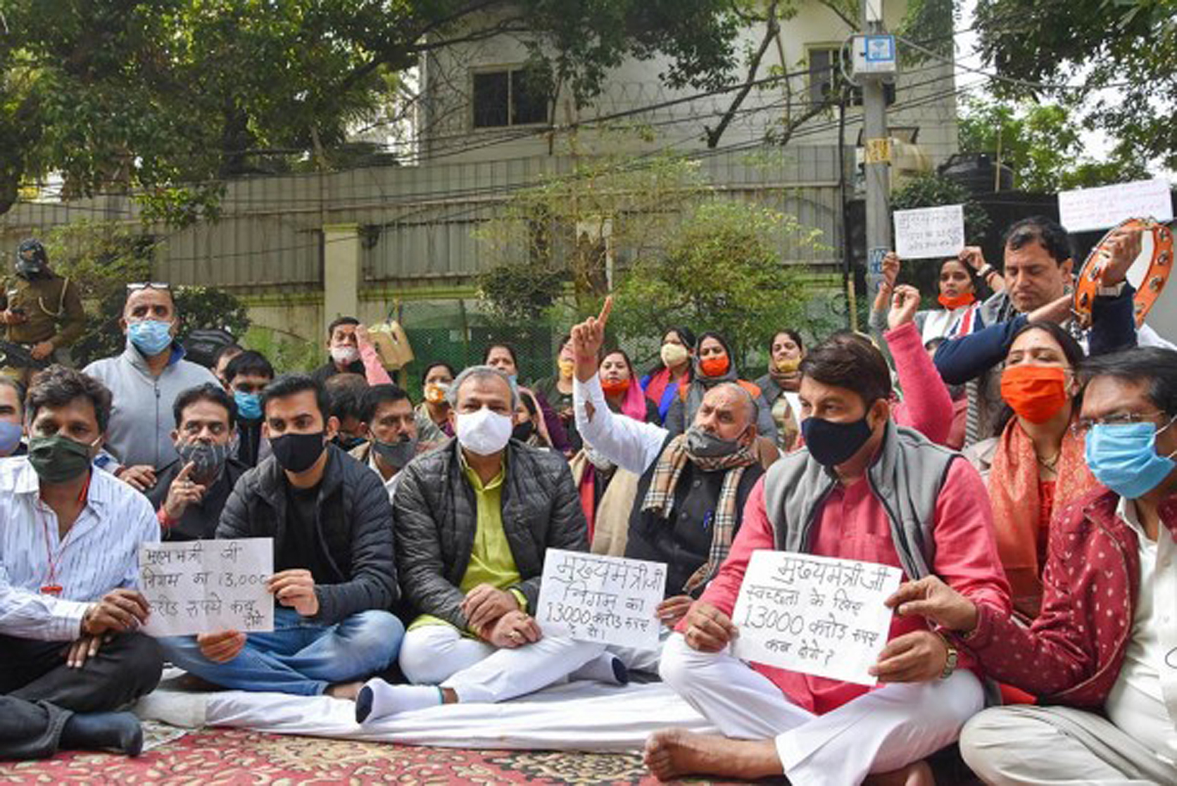 BJP MPs Manoj Tiwari and Gautam Gambhir with Delhi BJP President Adesh Gupta and others during a protest outside Delhi CM's residence, in New Delhi. BJP MPs Manoj Tiwari and Gautam Gambhir with Delhi BJP President Adesh Gupta and others during a protest outside Delhi CM's residence, in New Delhi.