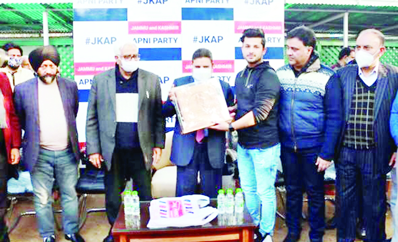 Apni Party president honouring awardee of Roller-skates at Jammu on Tuesday. Apni Party president honouring awardee of Roller-skates at Jammu on Tuesday.